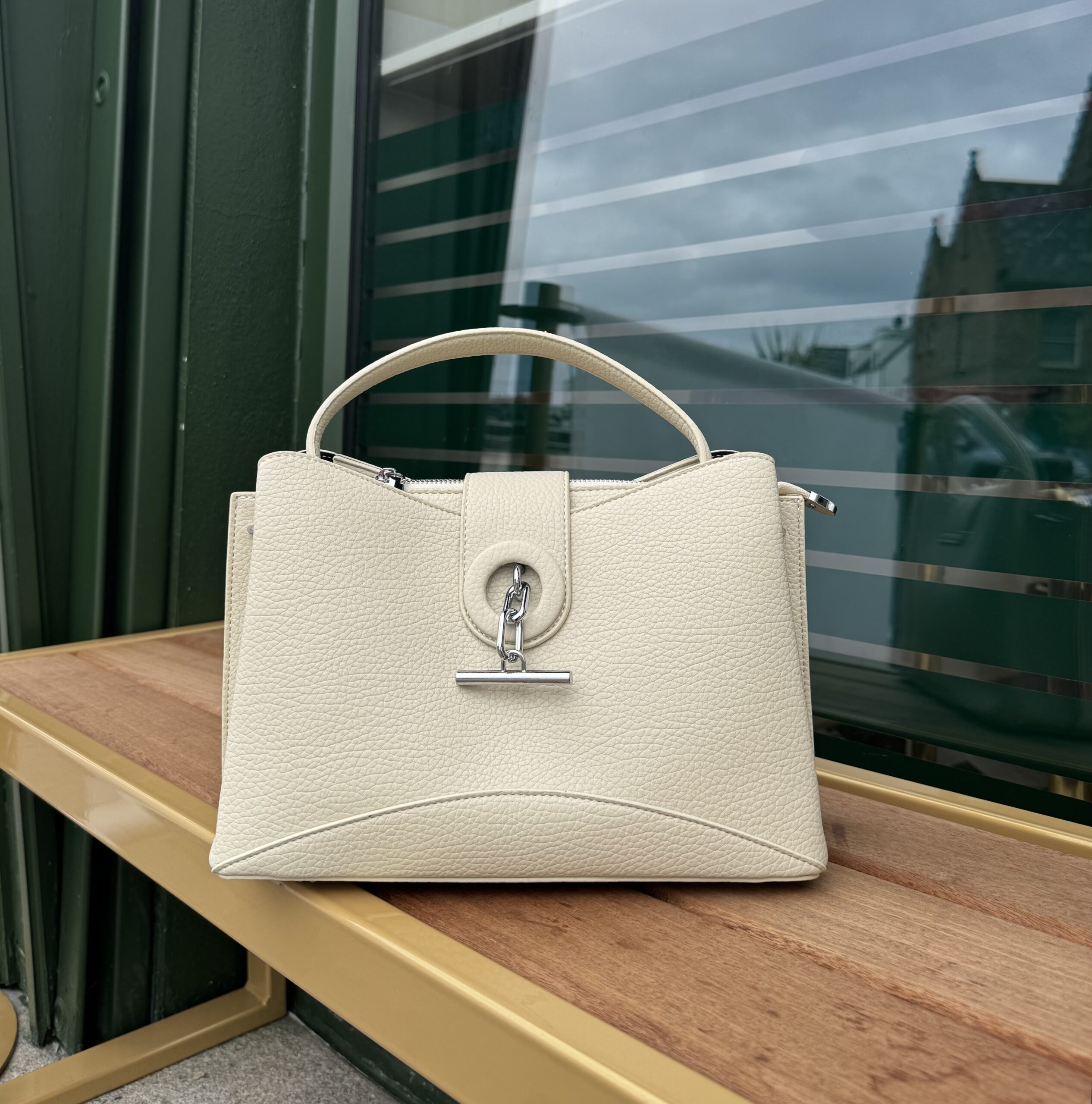 Elara – Champagne Cream Buckle Bag with detachable crossbody strap produ